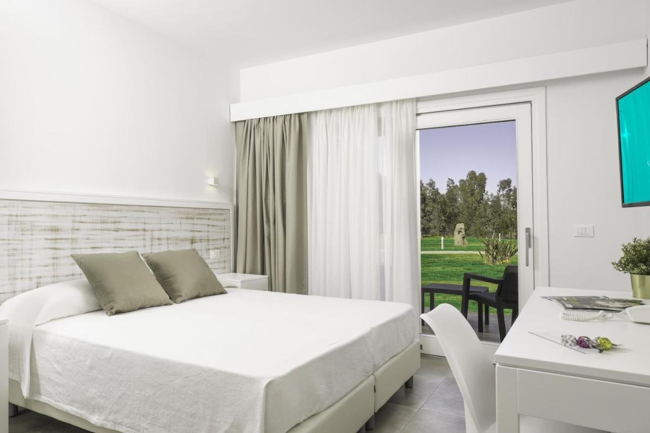Hotel S'Arena Beach La Caletta Bagian luar foto