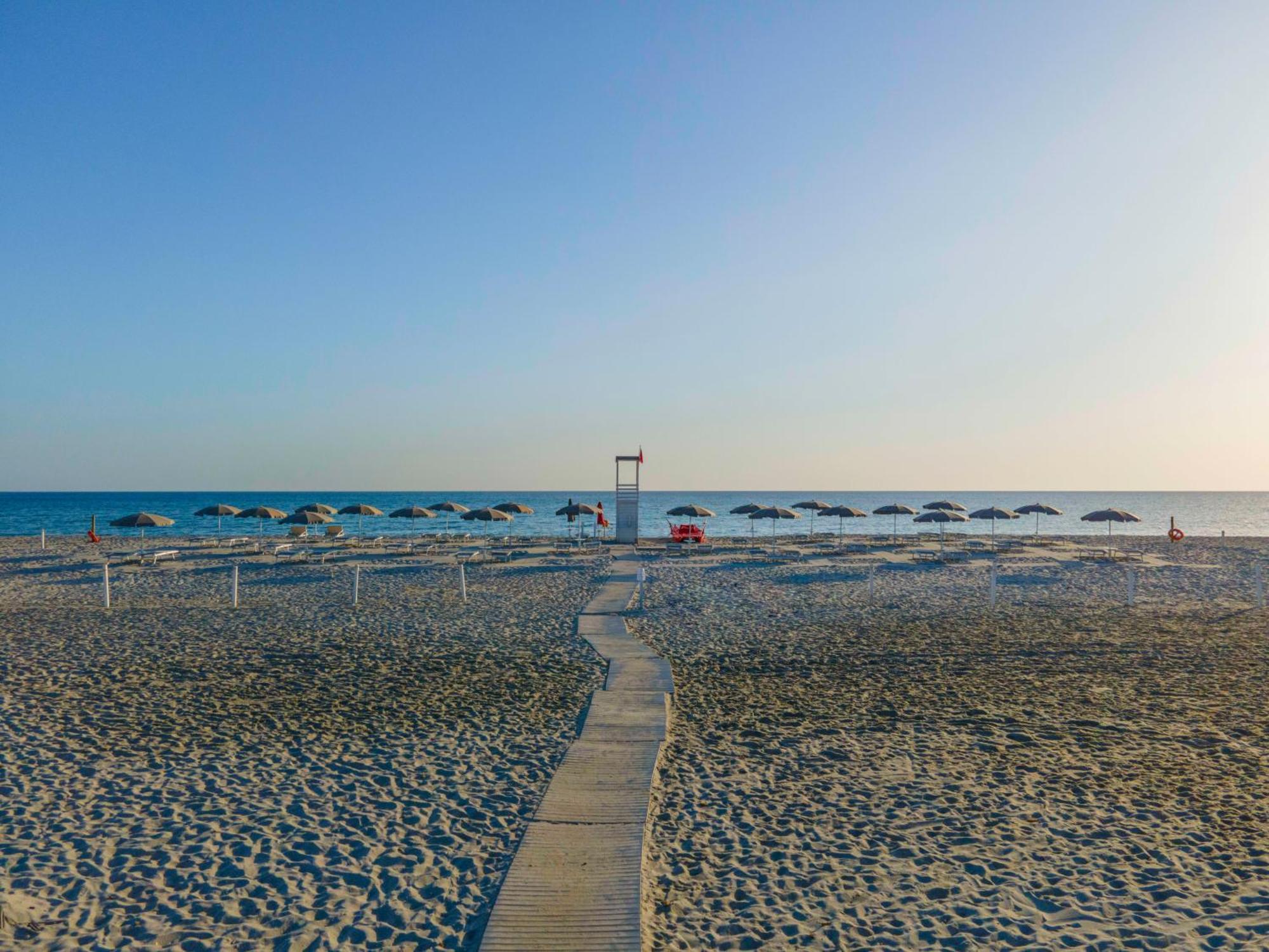 Hotel S'Arena Beach La Caletta Bagian luar foto